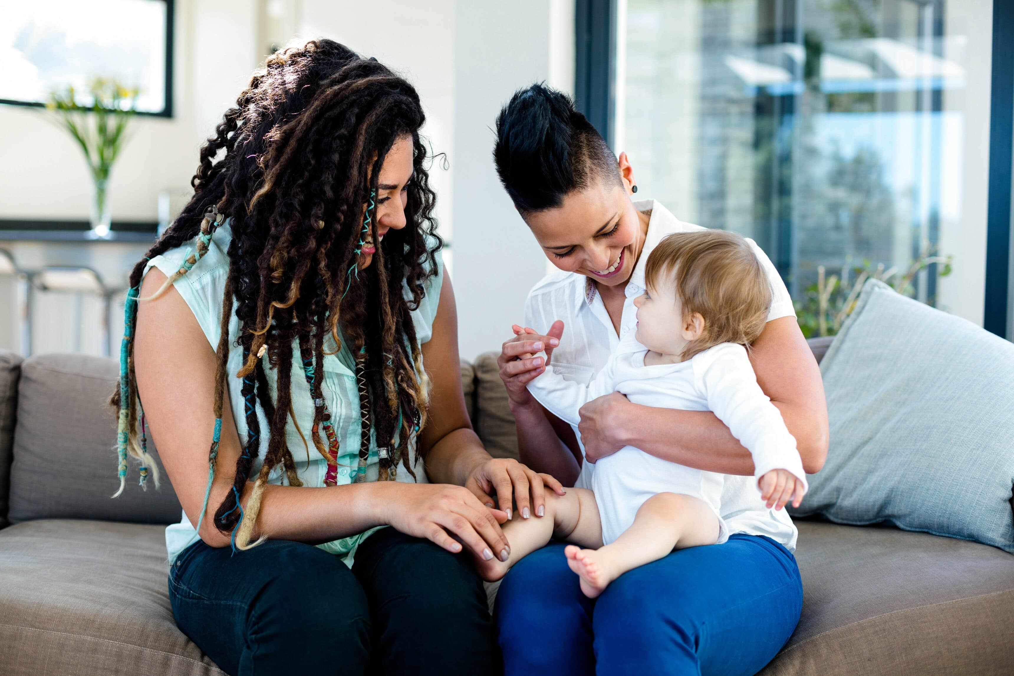 Couple playing with their baby